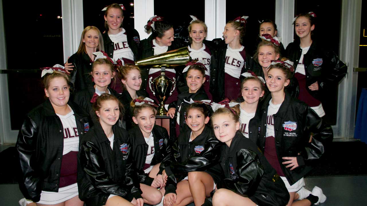 pbjhs-cheerleaders-with-trophy.jpg