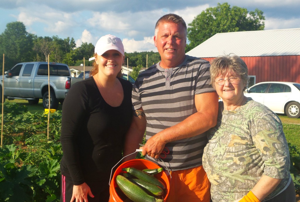 Danielle Berry, Murray Hammond and Sarah Chaffin in their beautiful neighborhood garden