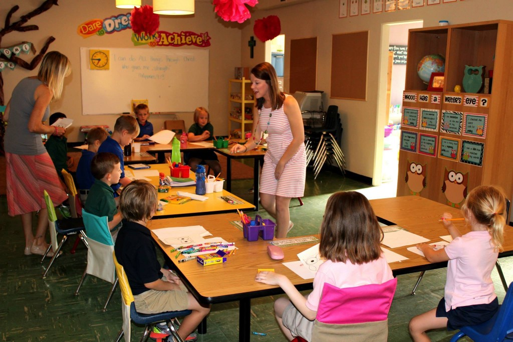 Miss Ingram and her assistant Ms. Long working with their K-2 class.
