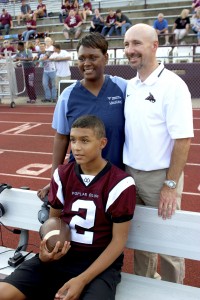 Young Caleb Morrow and his mother Tamara Lewis thank Heath Willis of Focus on Physical Therapy.