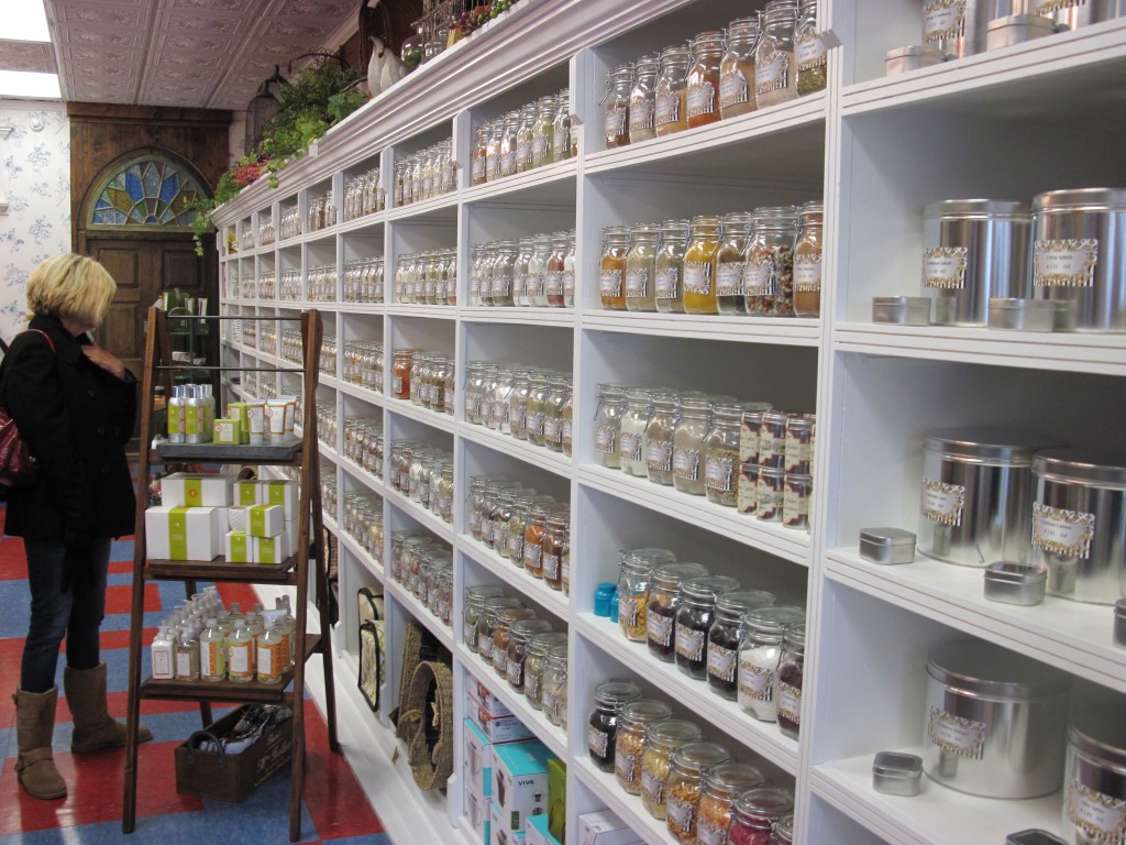 A customer making a selection of spices at The French Market