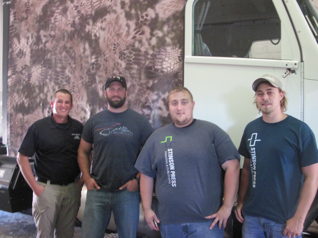 Laramy Gregory, Jared Ogden, Levi Casey and Alex Nicolini take a break Monday at Gregory Logistics in Poplar Bluff. SEMO TIMES photo by Steve Hankins