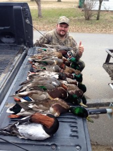 Danny Bright from East Prairie, Missouri with a pile of "last day" ducks