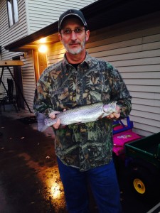 Perry Jackson with a Rotary Lake rainbow trout