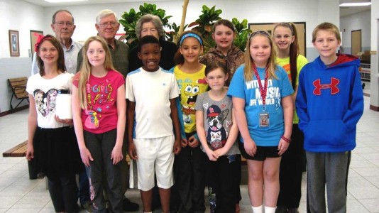 Pictured are students (front row from left) Aeries Webb, Allison Hicks, Jalonnie Johnson, Alexis Allred, Kayla Andrus, and Ethan Alford; (back row from let) PBHDRC president Jim Chrisman, vice president Ken Clanahan, board member Shirley Davenport, and students Kearra Mikel, Madilyn Hillis and Natalie Whitehead.