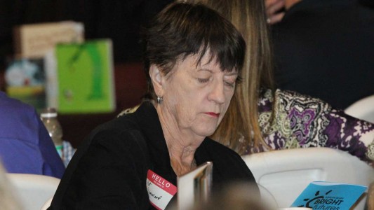 Attendee Pat Damewood was among over a dozen people who filled out a volunteer card to get involved with Bright Futures Poplar Bluff last week during the annual symposium. 